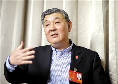 今年全國兩會期間，全國人大代表、浙江高院院長齊奇接受記者采訪。新京報記者 陳杰 攝