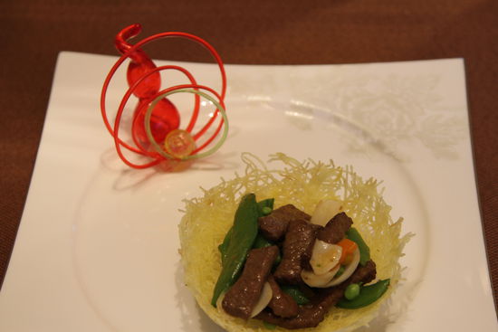 雀巢爆羊柳。 花惠生 供圖